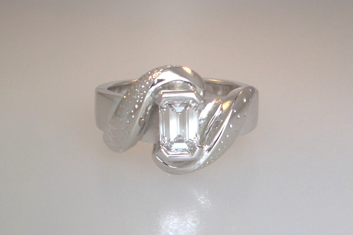 silver band with rectangle diamond