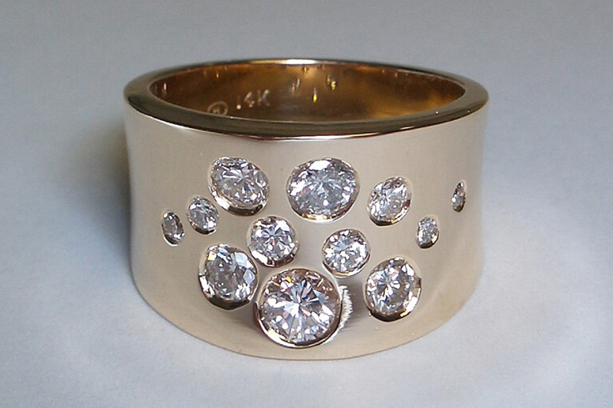 thick banded ring with multiple diamonds